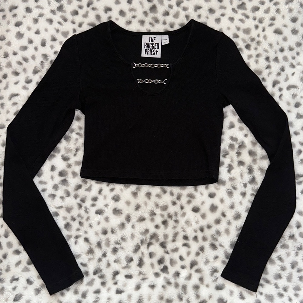 This is a black crop top with chains in the front size small